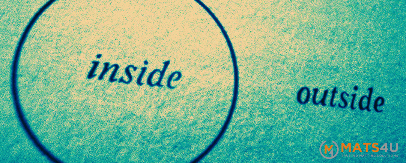 Should my doormat be inside or outside?