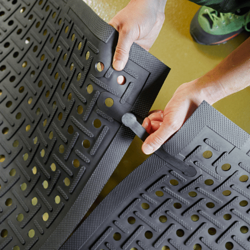 Anti-Microbial Comfort Rubber Mat with drainage holes and connector system