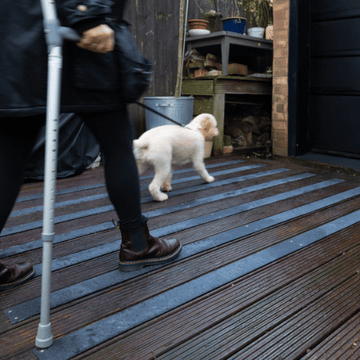 GripGuard Decking Strips installed on a wooden deck, providing anti-slip safety in an outdoor setting