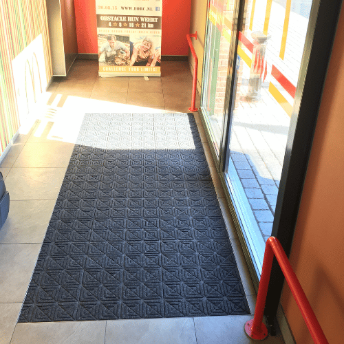Waterhog Eco Premier Matting Tiles installed in a high traffic entrance