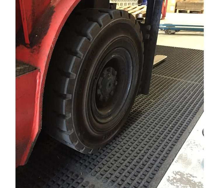Close up of Waterhog Modular Forklift Mat showing textured surface